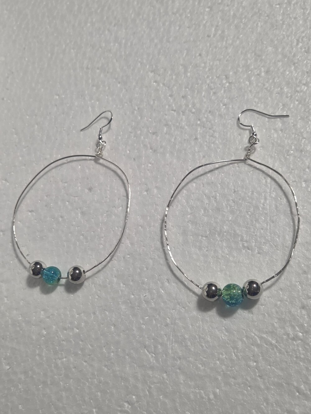 Handcrafted Silver Hoop Earrings with Blue-Green Glass Beads